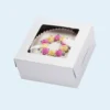 Stacked square cake boxes with handles for takeaway orders